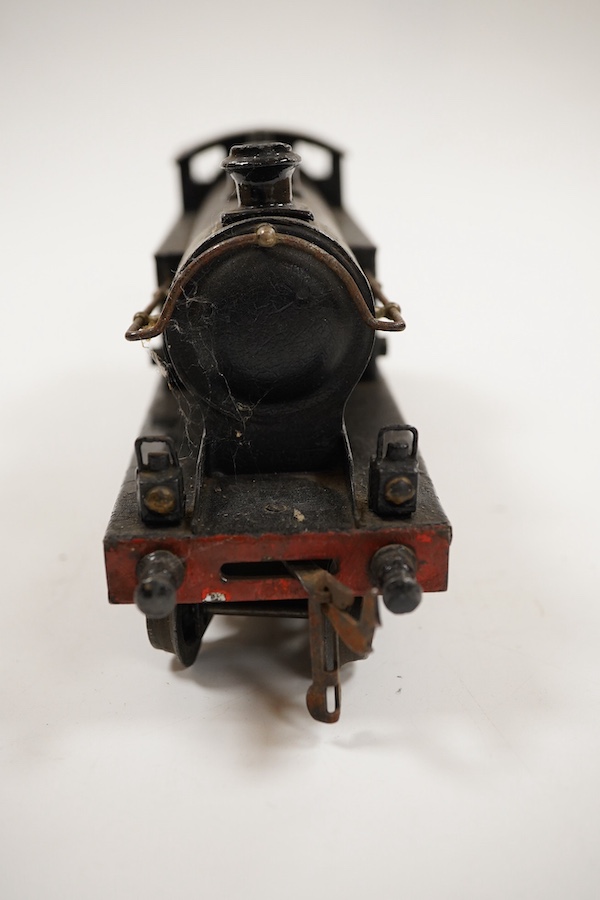 An 0 gauge Bing for Bassett-Lowke tinplate clockwork LNWR 4-4-0T locomotive, 3611, with original clockwork mechanism